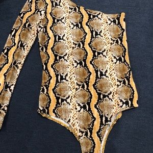 Women’s snake pattern bodysuit